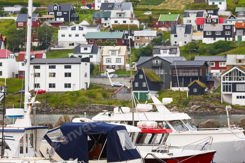 Preview: Picturesque colorful village and harbor of Sandavagur. Faroe islands coastline