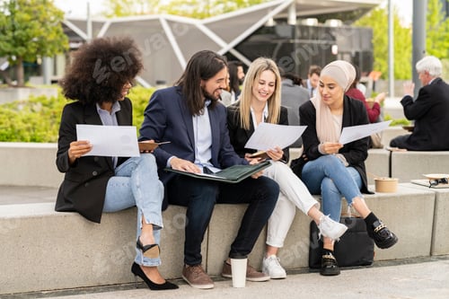 Preview: Multi-racial group of business people bonding outdoors