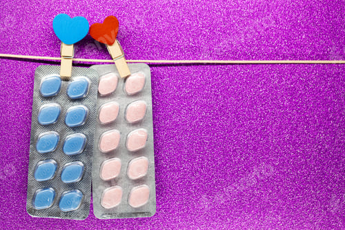Preview: Pill for men's health and Valentine day background.