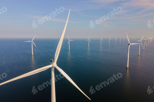 Preview: offshore windmill park with clouds and a blue sky