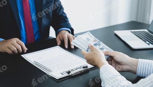 Preview: Businessman hand bribe the money to the government official sign the contract