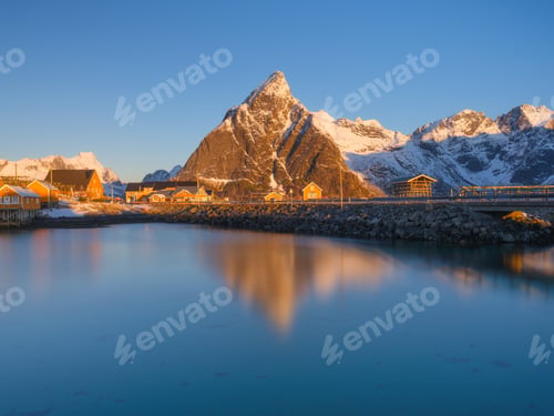 Preview: Natural winter landscape. Picturesque view of traditional Norwegian fishermen's houses.