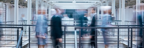 Preview: Business people talking in corridor