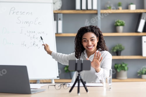 Preview: Video conference e-learning with teacher in room at home