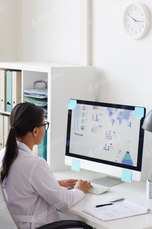 Preview: Doctor using computer at work