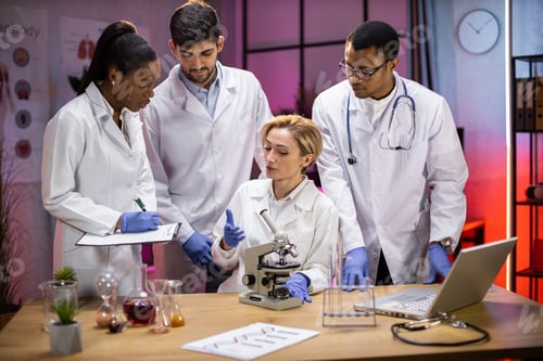Preview: Team of medical research scientists work on a new generation disease cure.