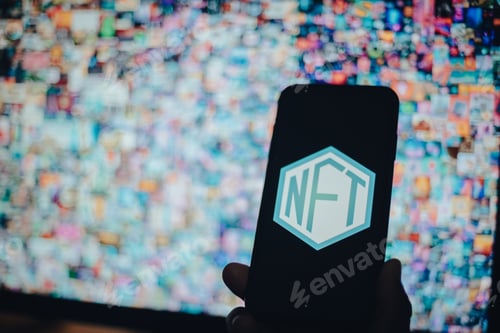 Preview: A person holding a mobile phone with an NFT with a desktop wallpaper in the background