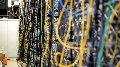 Preview: Multicolored data center wiring. Stock footage. Close-up of wall of computer data centers with lots