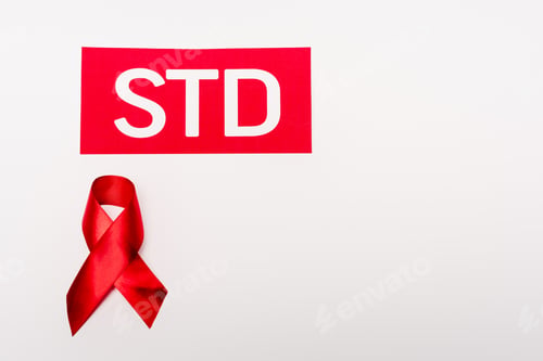 Preview: top view of red ribbon near std lettering isolated on white