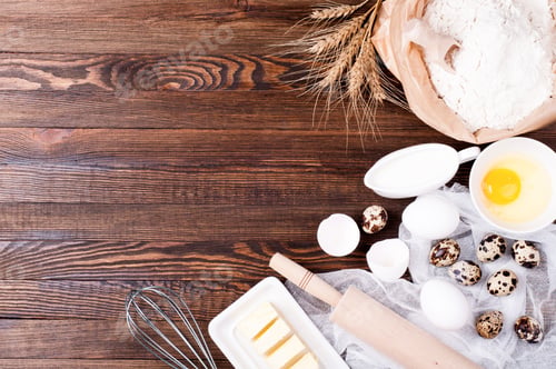 Preview: Baking background. Ingredients for cooking. Flour in paper bag, eggs, butter, kitchen utensils