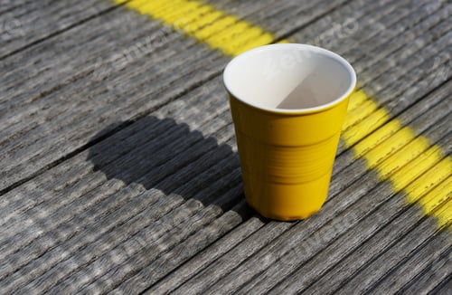 Preview: Yellow mug and yellow line: minimalism.
