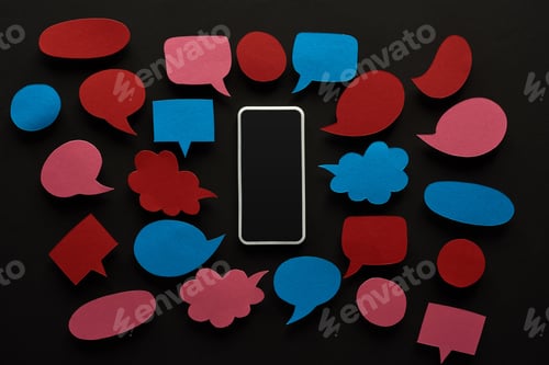 Preview: top view of smartphone with blank screen on black background with empty red and blue speech bubbles,