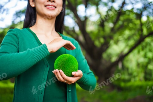 Preview: A male hand holds a hammer, symbolizing the enforcement of tree conservation laws. This highlights