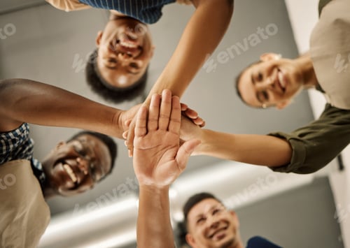 Preview: Diverse businesspeople hands stacked from below. Group of fashion designers celebrating and motivat