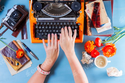 Preview: Workspace with vintage orange typewriter