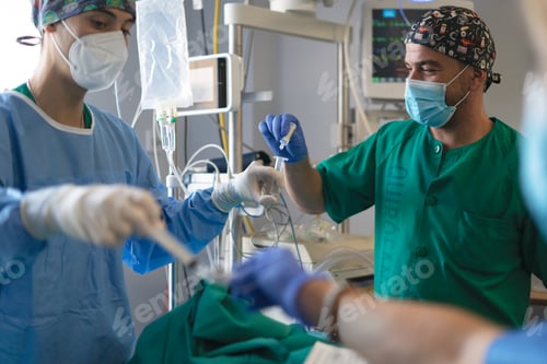 Preview: Medical team collaborating in operating room during surgery
