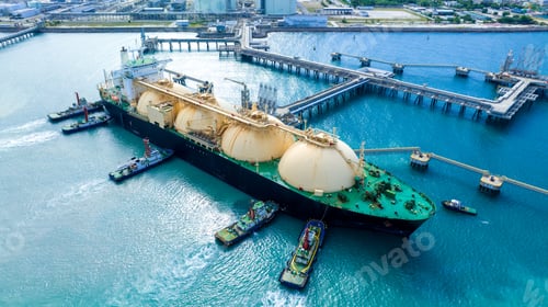 Preview: LNG (Liquefied natural gas) tanker anchored in Gas terminal gas tanks for storage. Oil Crude