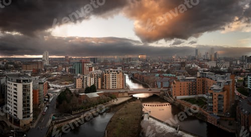 Preview: Aerial panorama of Leeds Dock and River Aire in a cityscape skyline at sunrise