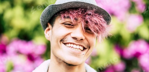Preview: Happy cheerful handsome trendy alternative young man teenager portrait
