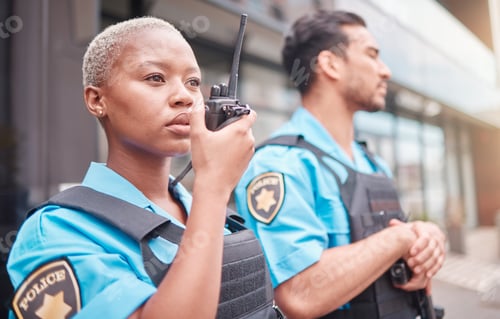 Preview: Police, radio and patrol with a black woman officer outdoor on a city street for law enforcement. W