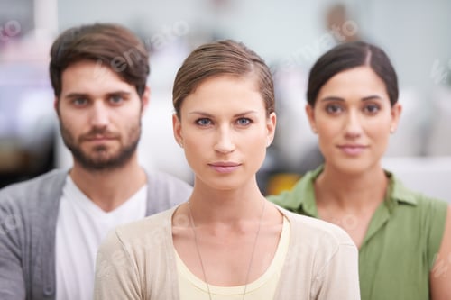 Preview: Were focused on our future. Cropped shot of three work colleagues in the office.