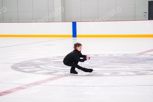 Preview: Girl Ice Skating Gracefully On An Indoor Rink