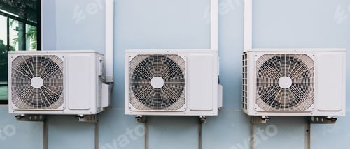 Preview: Air conditioner compressor installed on the roof of a building.