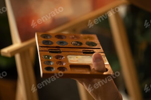 Preview: Artist painting a artwork with water color art brush, artistic painter oil background