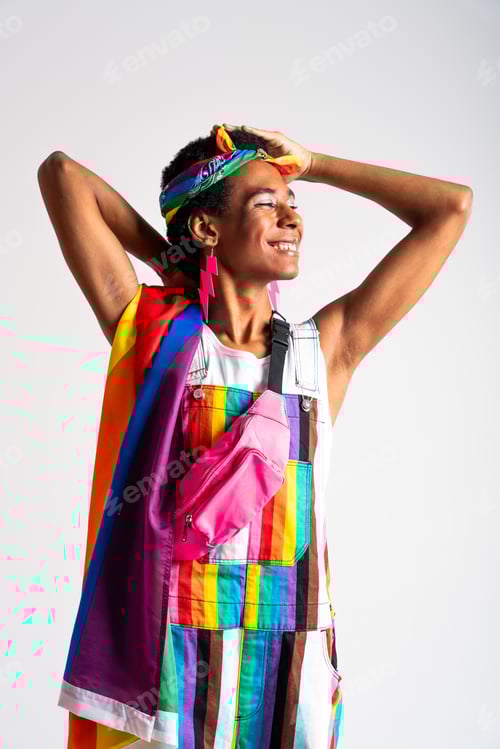 Preview: Fashionable fluid gender man posing in studio