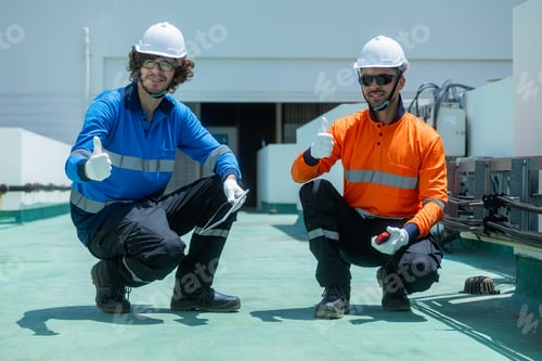 Preview: Engineers inspecting rooftop electrical equipment
