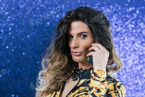 Preview: Drag queen talking to the mobile phone