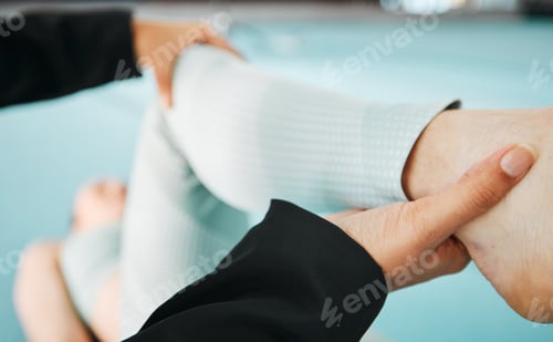 Preview: Ankle, fitness and coach with athlete in gymnastics, people in gym with body warm up, training and