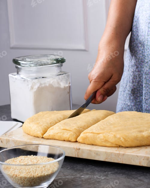 Preview: Woman Cut Bread Dough