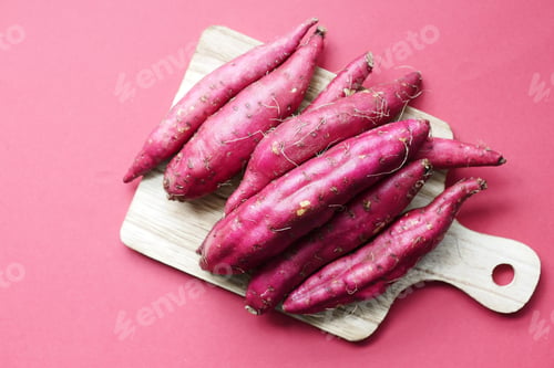 Preview: Close up of raw sweet potato in a bowl