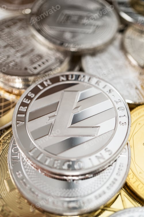 Preview: Close-up Of Litecoin Physical Coin On Stack Of Many Other Cryptocurrencies
