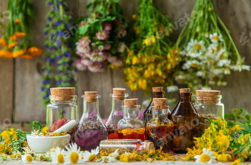 Preview: Tincture of medicinal herbs in bottles. Selective focus.