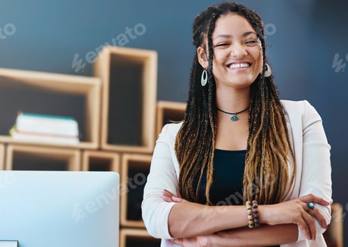 Preview: Cropped portrait of an attractive young woman standing with her arms crossed in her home office