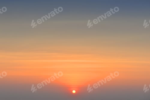 Preview: Sunset sky. Abstract nature background. Dramatic blue and orange, colorful clouds at twilight time.