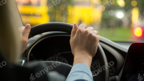 Preview: Caucasian girl woman hands female driving rental car driver traveling transport in city automobile