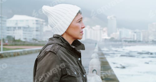 Preview: Thinking, morning and memory with old woman at beach for reflection, mental health and inspiration.