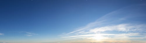 Preview: Beautiful Panoramic View of colorful cloudscape with blue Sky in Background