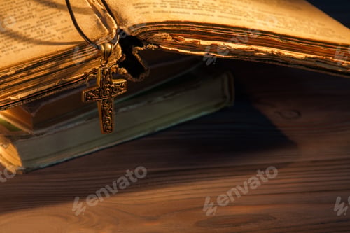 Preview: Rosary and cross on the old ancient bible.
