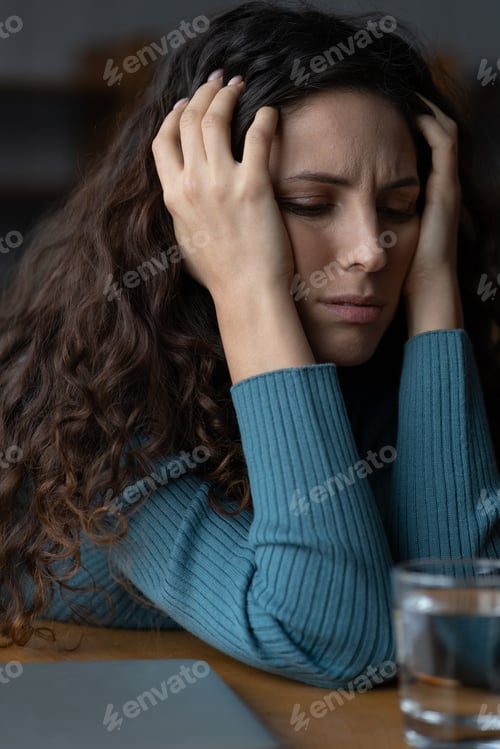 Preview: Stressed worried female employee feeling anxious about deadline at workplace. Work anxiety concept