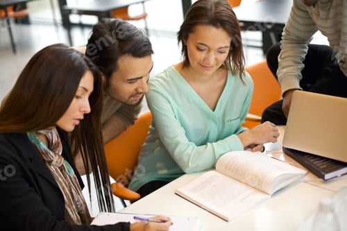 Preview: Group of students studying in a library