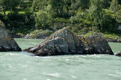 Preview: A wide, full-flowing mountain river with a fast current.