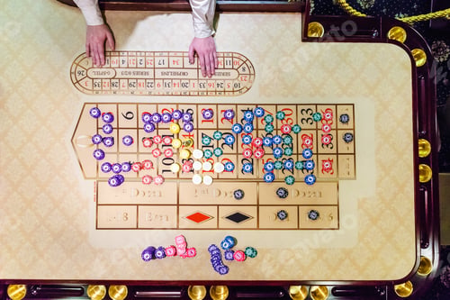 Preview: gambling chips on a game table roulette