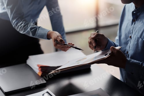 Preview: The business team jointly plan the investment at the meeting. Close-up of business advisor pointing