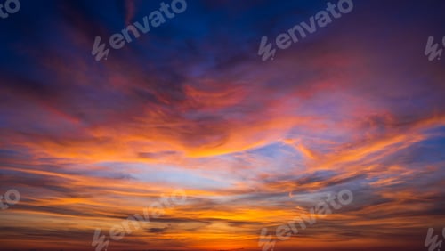 Preview: Sunset sky clouds with colorful and dramatic red, orange, yellow sunrise blue sky in the morning