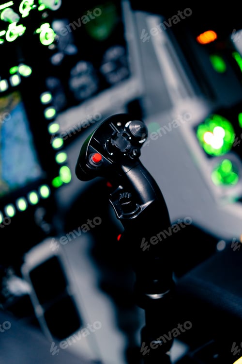 Preview: close-up of the cockpit of a military aircraft with a steering wheel and many buttons control panel