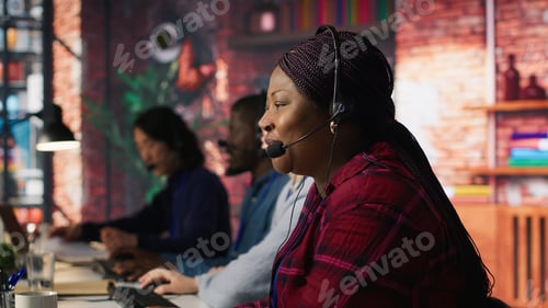 Preview: Friendly account manager in office maintaining strong client relationships